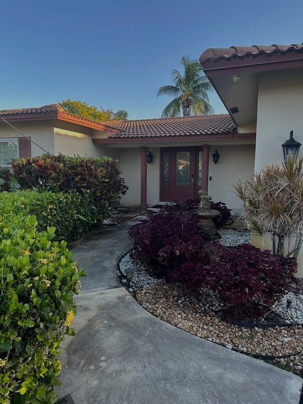 Beautiful South Florida home exterior after house washing — TitanFlow Exteriors